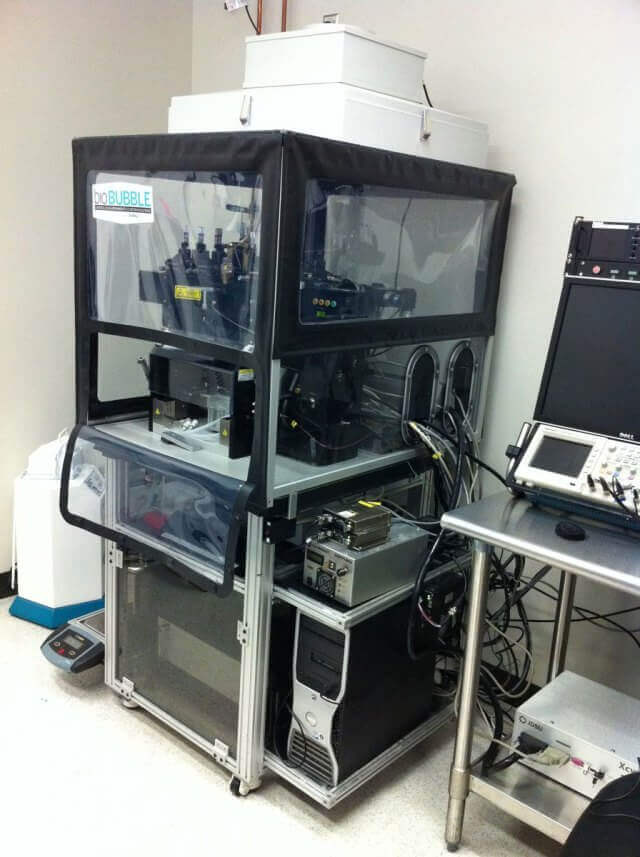Custom containment cabinet for a BD Influx™ Cell Sorter