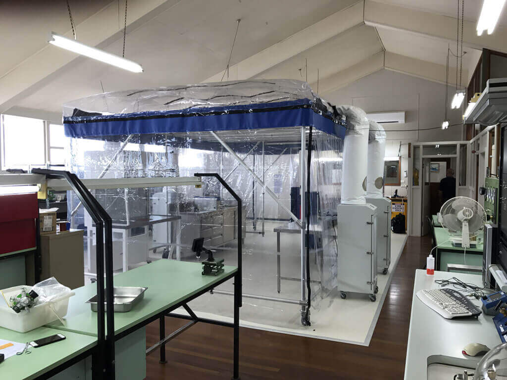 AEOS cleanroom for aircraft instrument refurbishing designed to run at ISO 5 or ISO 6 conditions.